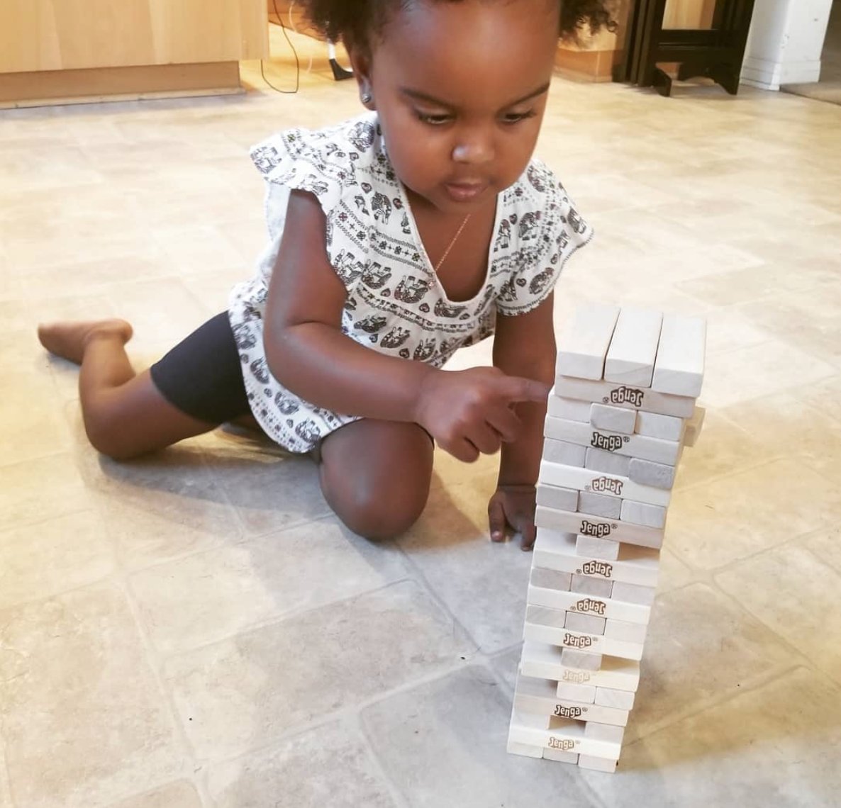 JENGA's tweet photo. We can tell she's going places. #JengaMaster (photo: @dziredstylez) https://t.co/uyJqYOTu9o