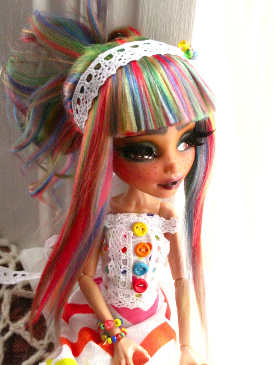 AmBorisenko's tweet photo. Here is my new doll! I wanted her to be very colourful and I wanted to try a more expressive eyebrow. I'm quite proud of her dress, I sewed it by hand without a pattern, and I made the buttons out of polymer clay! #mhrepaint #ooakdoll #rainbow #dollcrafts #dollrepaint #custom https://t.co/Lle2fpkf4T