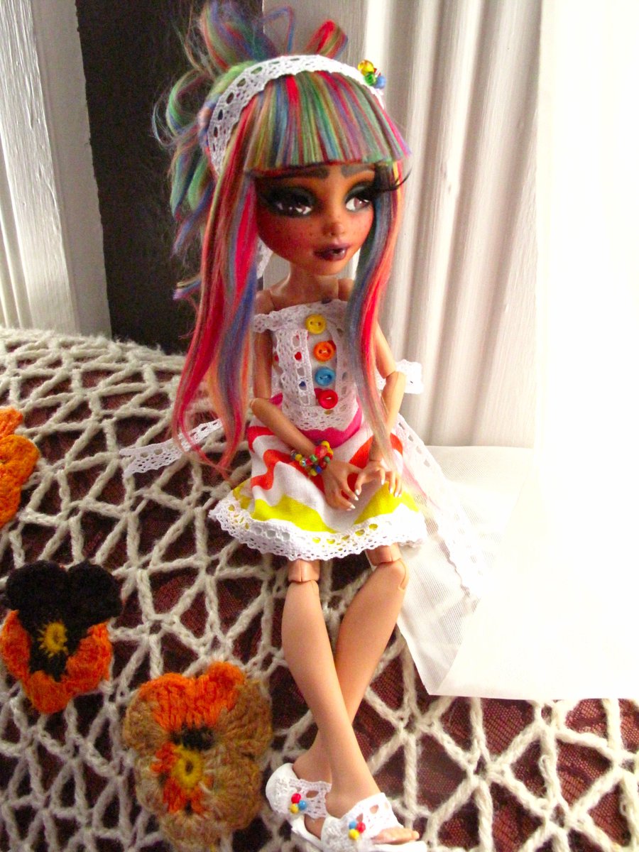 AmBorisenko's tweet photo. Here is my new doll! I wanted her to be very colourful and I wanted to try a more expressive eyebrow. I'm quite proud of her dress, I sewed it by hand without a pattern, and I made the buttons out of polymer clay! #mhrepaint #ooakdoll #rainbow #dollcrafts #dollrepaint #custom https://t.co/Lle2fpkf4T