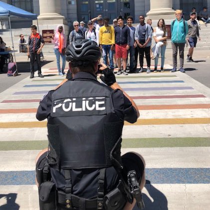 KP_Community's tweet photo. @KingstonPolice School resource officer Brian McMillan lends a hand to some of the many people attending Indigenous Peoples Day at city hall today.  Nice shot Brian 👍🏻 #ygk https://t.co/la8HhM6H6Z