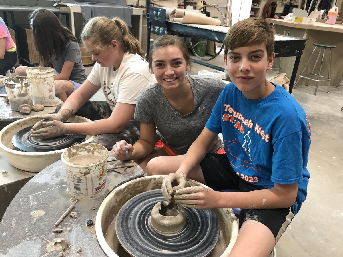 Tecumsehartists's tweet photo. Past, present and future artists working together on the wheel. So much fun to watch the learners I taught help teach the middle school clay campers! https://t.co/f4Lx7tiviP