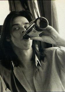 cavethings's tweet image. nick cave drinking