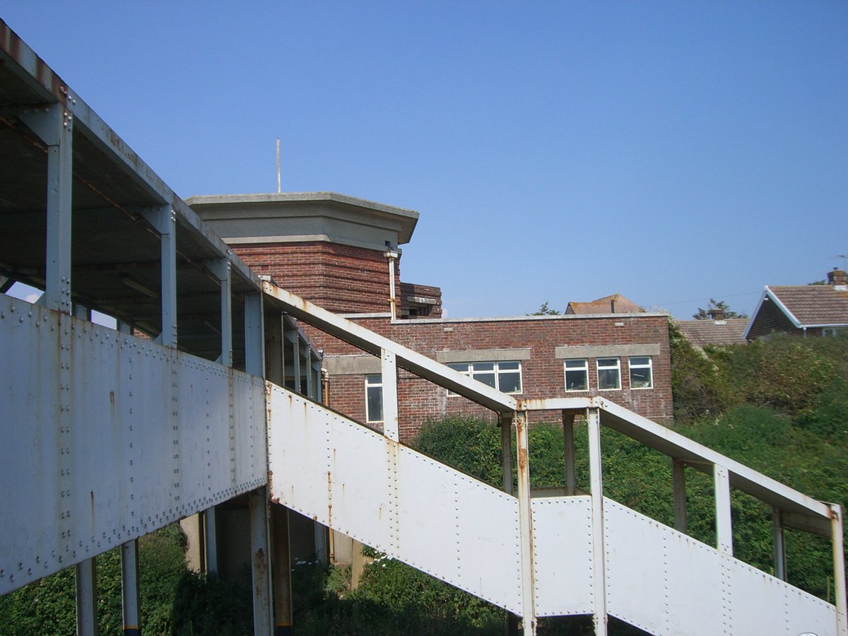 PillboxSG's tweet photo. Two Double Embrasure #WW2 #Machinegun #Pillboxes Were Built On Top Of #ArtDeco Designed #Bishopstone #SouthernRailway Station #EastSussex To Give Good #FieldsOfFire Over Low Lying Ground. #AntiInvasionDefence https://t.co/f18Rc0THcz