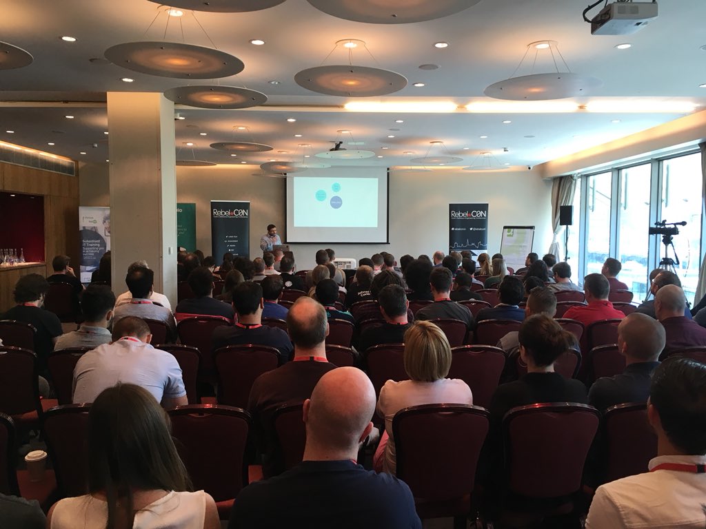 BestofCork's tweet photo. RT @Ems_Hanley: RT @PoppuloSays: Big turnout at #RebelCon for our own Tech lead David Lynam's talk. Our journey to modular UI development. #PoppuloPeople #Cork https://t.co/mc6hv6OOcr