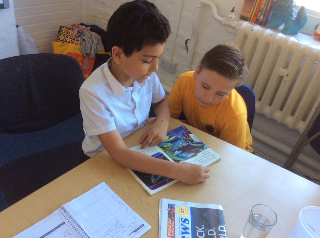 St_JamesSchool's tweet photo. Louie and Basem enjoying their Buddy #reading time! https://t.co/VcKmiVx1cr