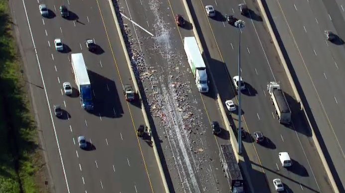 CTVToronto's tweet photo. Careless driving charge laid after truck loaded with yogurt crashes on Hwy. 401 https://t.co/ahGal4lzta https://t.co/SfeVmrNx8p