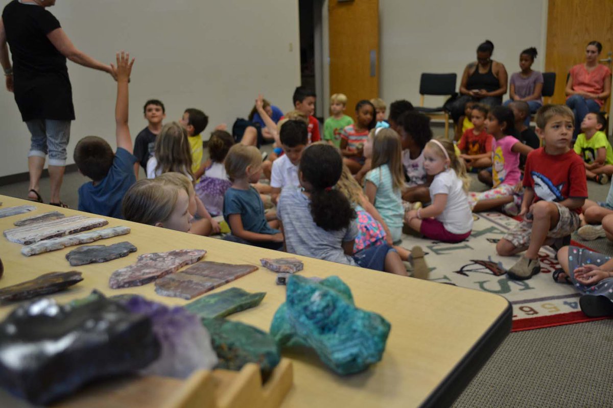 cobblibrary's tweet photo. Kids at #WestCobbLibrary learned all about minerals! The #TellusScienceMuseum lent the library some really cool minerals for kids to hold and see. And they also got the opportunity to make their very own crystal necklace! https://t.co/CiffxOU0LE