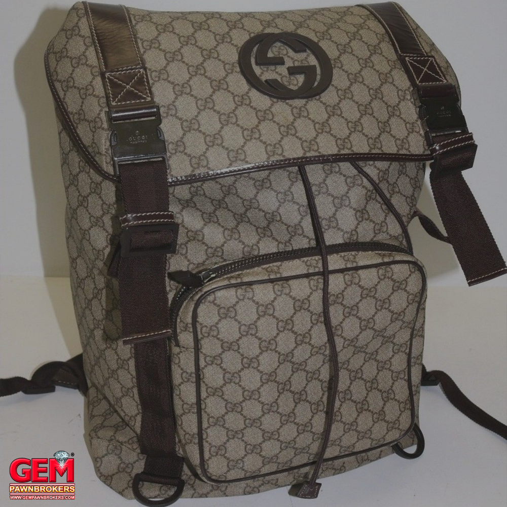 gempawnbrokers's tweet photo. Today we're #stylingonabudget with this Gucci Men's Natural GG Canvas Interlocking G Large Backpack Brown. Don't pay full price when you can shop at GEM and get it for a deal!! https://t.co/oWXG3X0KTJ #GEM #GEMPawnbrokers #Pawn #Pawnshop #Gucci #Guccibackpack #styleonabudget https://t.co/VqKtY5NT7Q