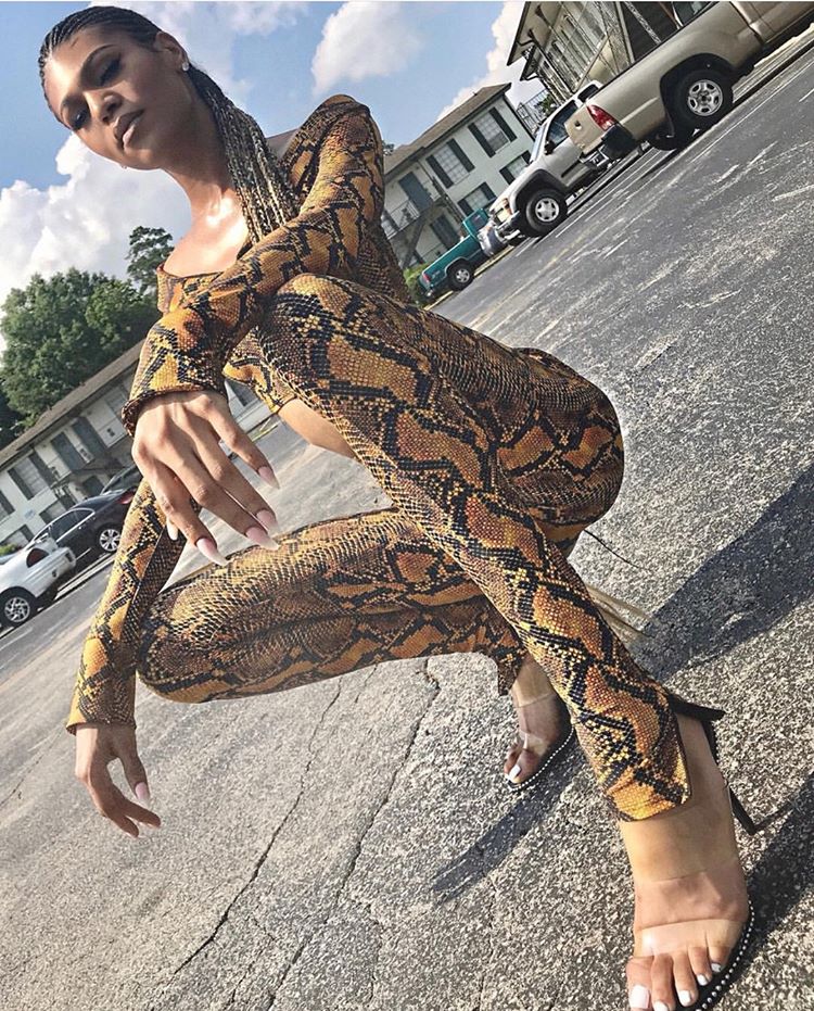 .@zoeyyfitzgeraldd keepin’ it too fly in our Orange Rattlesnake Crop Top + High Waist Pants😍 
Get the look now at klosetenvy.com