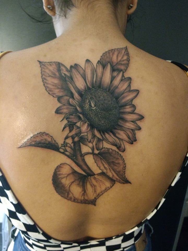 Black sunflower tattoo on the arm  Tattoogridnet