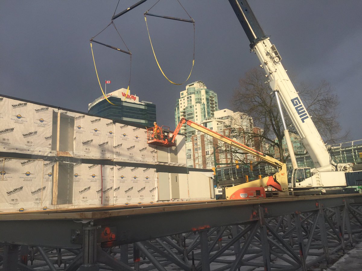 CityofVancouver's tweet photo. This weekend is your last chance to catch a glimpse of #temporarymodularhousing assembly in action at the 6th Ave and Ash St site. Come by to see how these 52 units will provide homes for lower-income &amp; homeless residents. https://t.co/6rcvnMZC7M