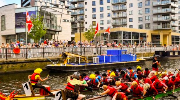 ArtHostelLeeds's tweet photo. It's the Waterfront Festival in Leeds today. Watch the dragon boat racing or find a spot on the banks of the River Aire to make the most of it. https://t.co/5pJ71tlH7C