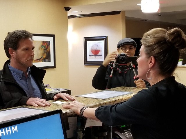 exitbagmovie's tweet image. Director/Cinematrogopher Juan Espinosa films as Philip Canton (Mike Pickering) and Hotel Hostess (Ashley Pickering) act out the lobby scene for The Exit Bag.