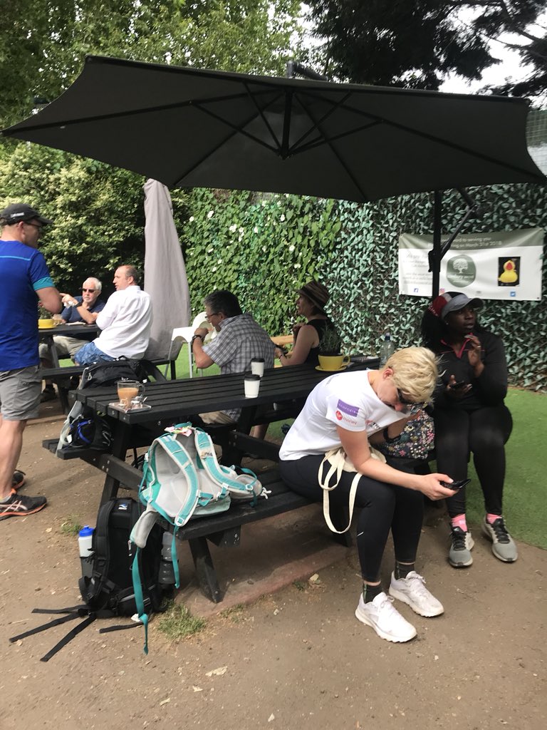 LondonLDWA's tweet photo. Tea interval at Canbury Secret, otherwise known as Cake Heaven, on the Thames Path #midsummerchallenge @LDWA1 https://t.co/sEhZHdrRar