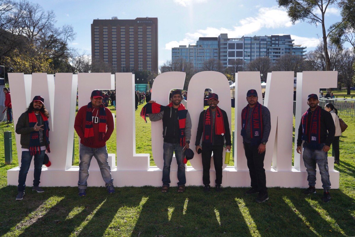 melbournefc's tweet photo. Welcoming new fans to the red + blue. 🙌
#TheWelcomeGame #RaiseHell #AFLDeesSaints https://t.co/CPNqWdPzUt