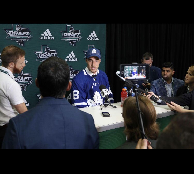 A year ago today I sat through 7 rounds of the NHL draft waiting for my name to be called and left hanging... today, I’m officially apart of the <a href="/MapleLeafs/">Toronto Maple Leafs</a> . Don’t let anything or anyone get in the way of your dreams. #LeafsNation