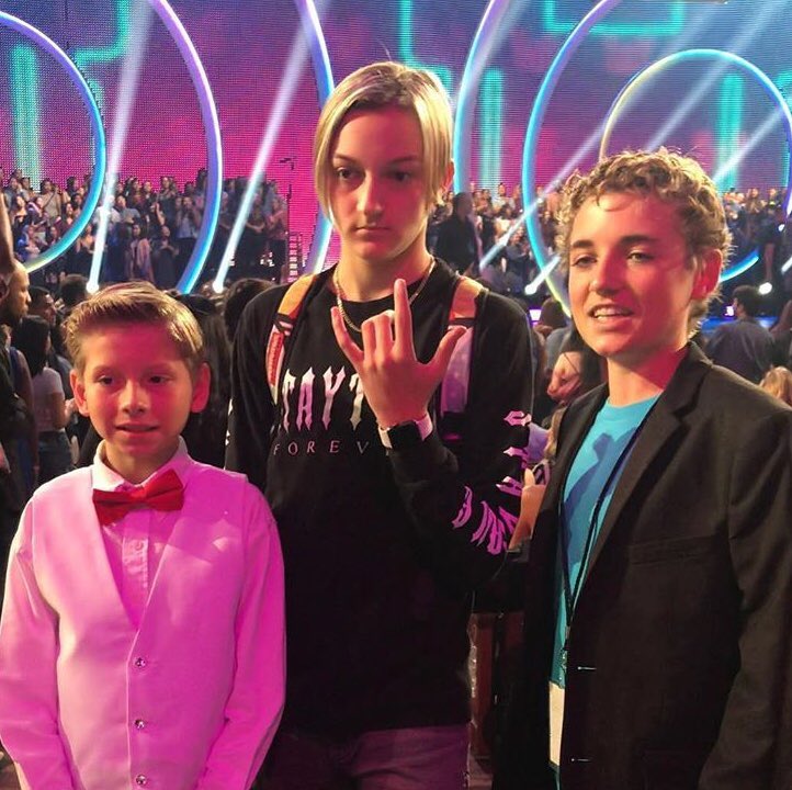*after pic is taken*

Backpack kid- yo Lil hank go steal us one of ur gmas cigarettes 

lilhank - golly, y’all musta had a twister run thru ur brain, how about we go look for mealworms out back instead 

Selfiekid- looks like someone just lost their invite to KingBachs afterparty