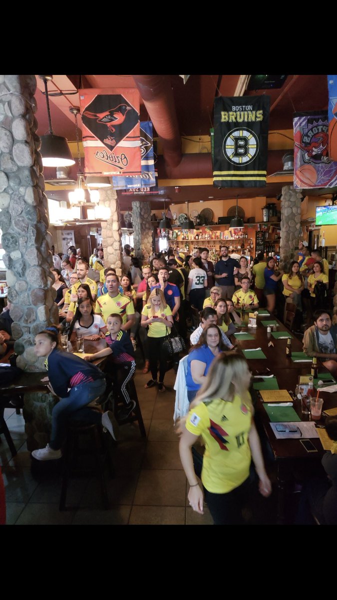 PaddyOs1's tweet photo. @deskon7 PaddyOs Boston on 33 Union St. is popping off right now as Colombian supporters invited by PaddyO’s to be headquartered there. it’s an electric atmosphere, Colombian Born NE Revs in Attendance &amp; Colombian Dignitaries #NERevs @NERevolution https://t.co/50GpUYAtNX