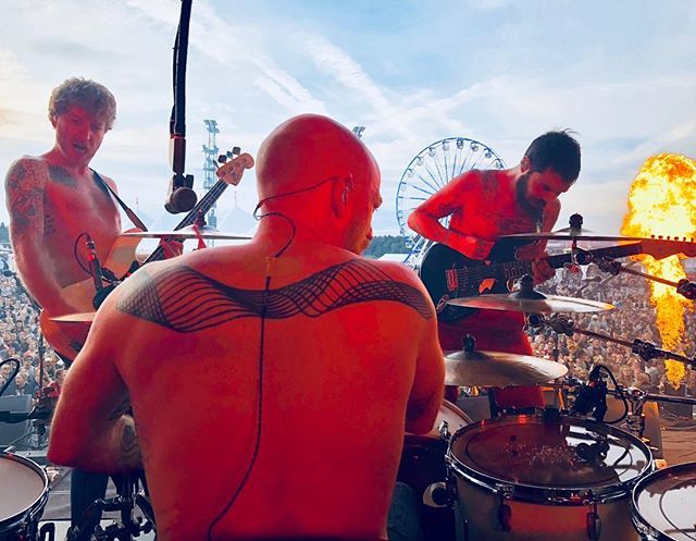 BiffyClyro's tweet photo. Three men and a flame! Thank you @southsidefestival for a killer show. Big love.x https://t.co/8sXq8nEnrW https://t.co/X04f6VqQeM