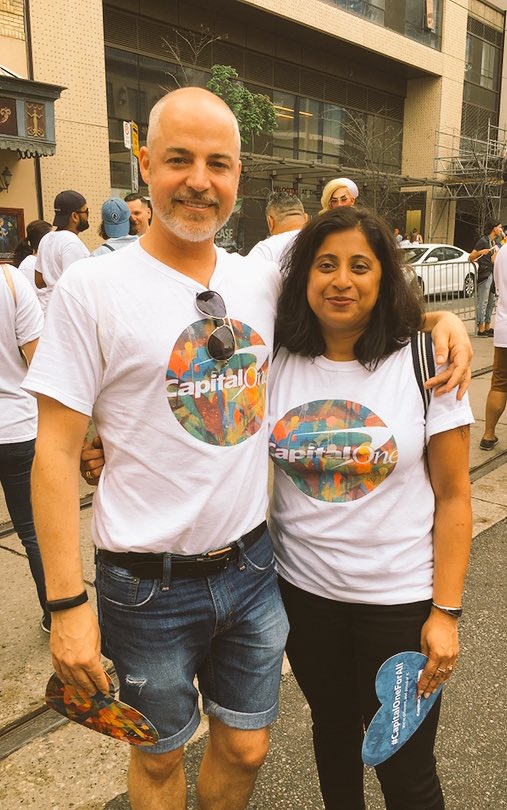 CapitalOneCA's tweet photo. Capital One Canada associates, @AClarkeYYZ and @sumaboby, celebrating #diversity at #PrideTo! #LGBTQ #CapitalOneForAll https://t.co/QAnJPkmTQO