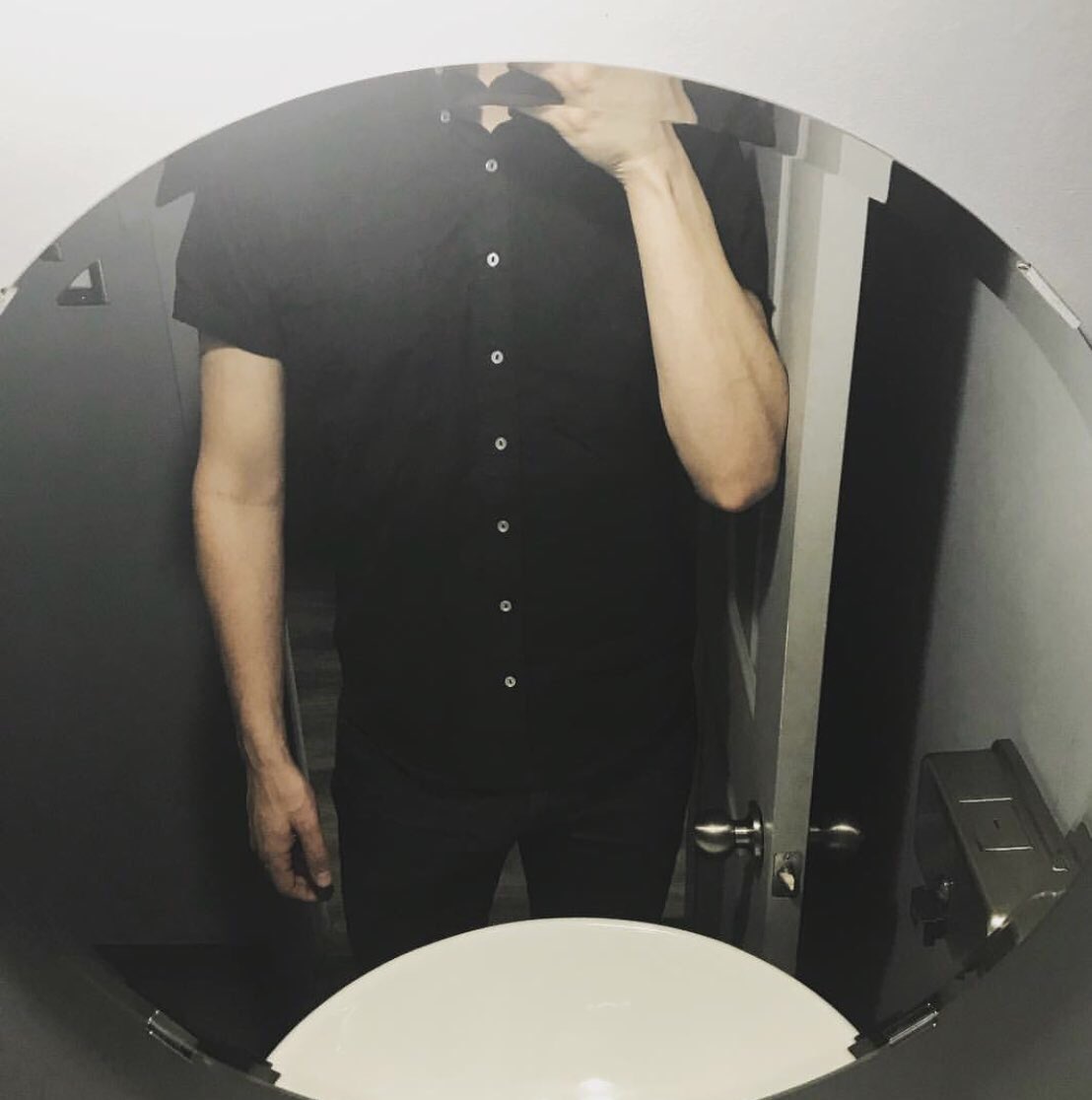 Has questions for the person who hung the bathroom mirrors