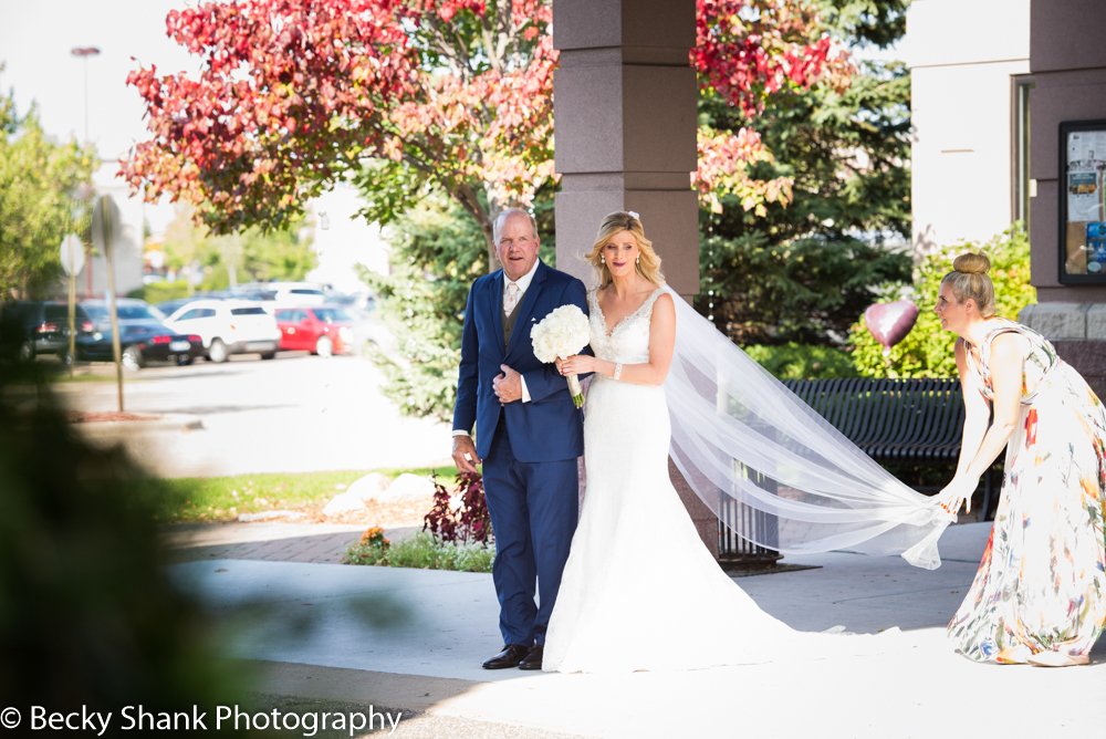 CourtyardsAndov's tweet photo. This one is a favorite from recent years. The beautiful bride being escorted out to the Courtyards. #herecomesthebride #mnwedding Photo by: Becky Shank Photography https://t.co/Ooz9wLoR2p
