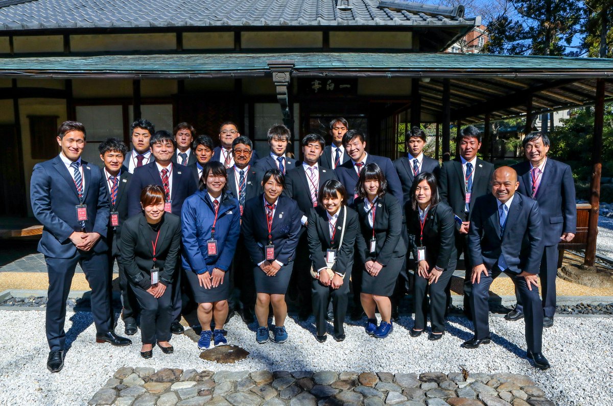 Group photo of judo athletes at the Embassy's teahouse