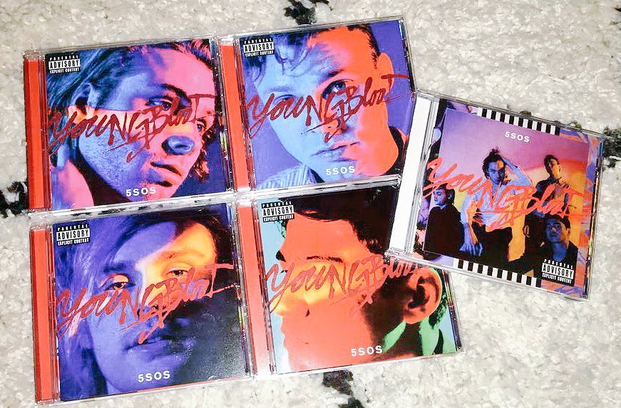 neonmoonlightx's tweet photo. Literally was walking into @Target yesterday when I got the notification from Billboard about #Youngblood going #1... 

so of course I felt like I needed to celebrate by completing the collection 🤷🏼‍♀️ so damn proud of you @5SOS 💜🌹#Congrats5SOS https://t.co/wMl8XkQGny