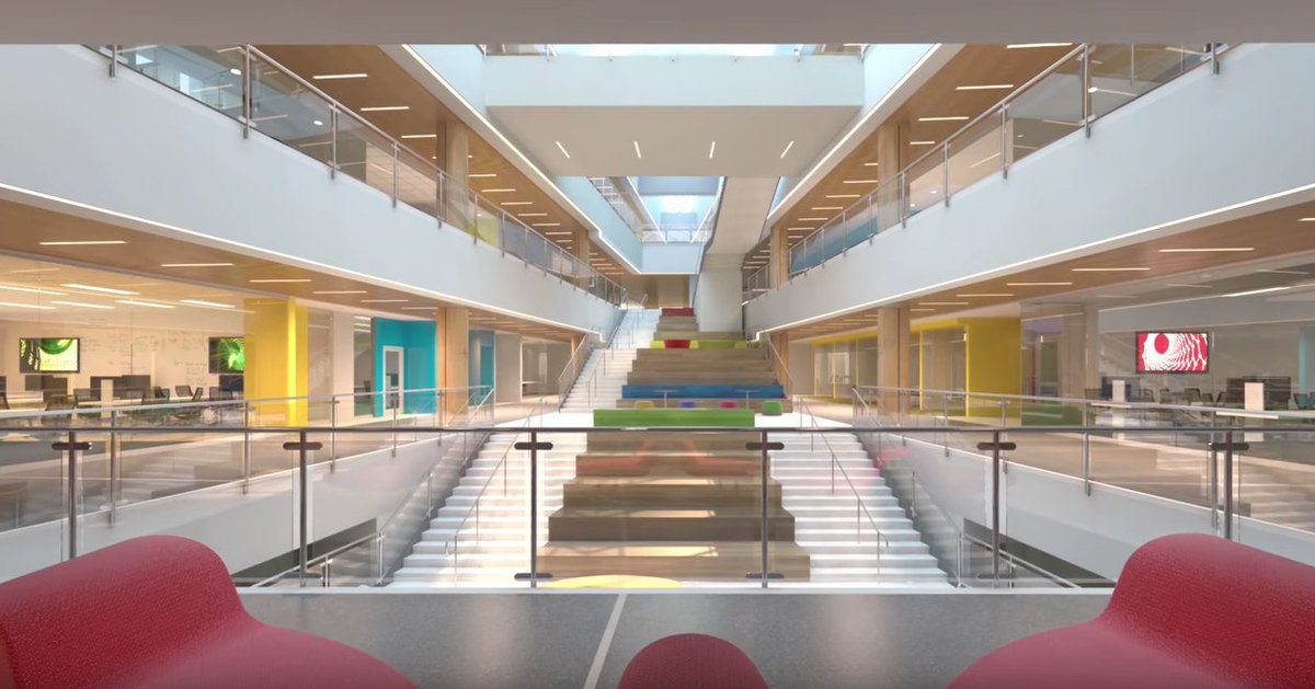 Rendering of a completed Zachry complex from the inside showing colorful stairs and lab areas