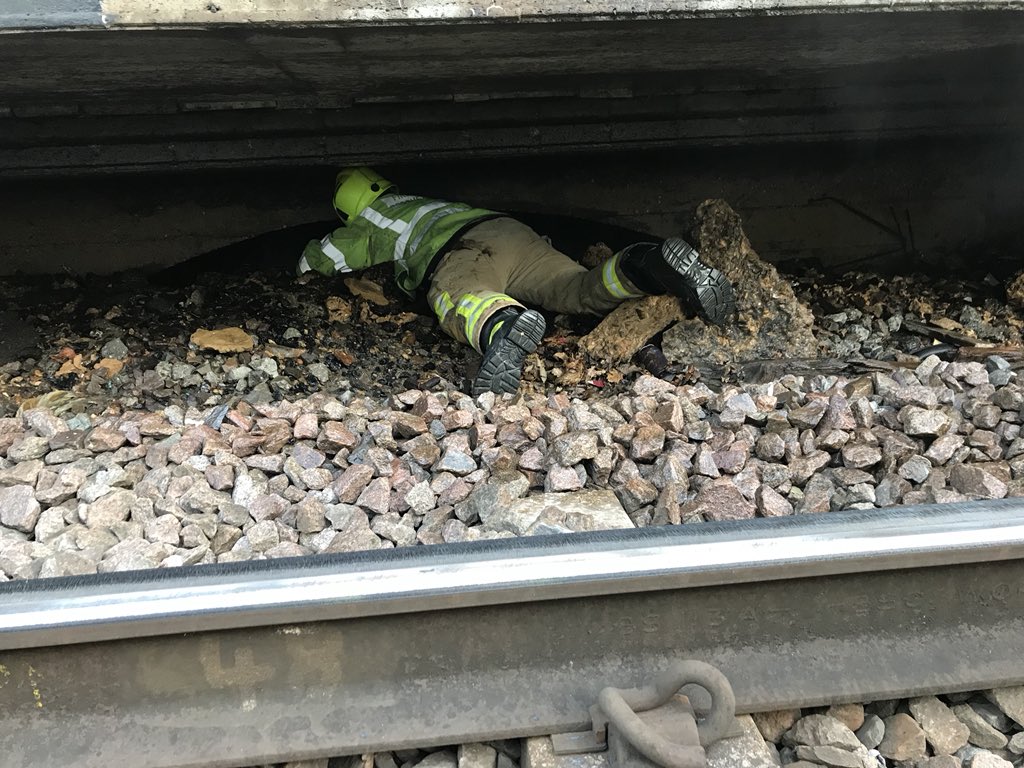 HertfordFireStn's tweet image. Red Watch @HertfordFireStn attended a small fire under the platform at Hertford North Train Station this morning with 3 additional railway sleepers also alight. Crews used an extended hose-reel and 'old school' hauling aloft techniques to gain access via rail bridge. #FireCraft