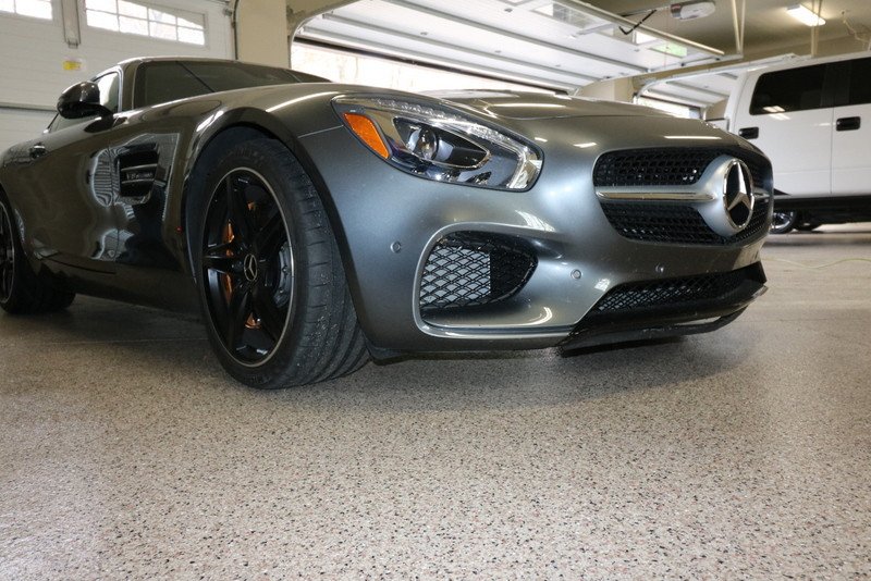 This garage flooring is resurfaced with epoxy coating. Colored flakes and chips are added to create a more decorative surface. Want this look for your garage? Call us @ 619) 443-2318 now. SanDiegoDecorativeConcrete.com