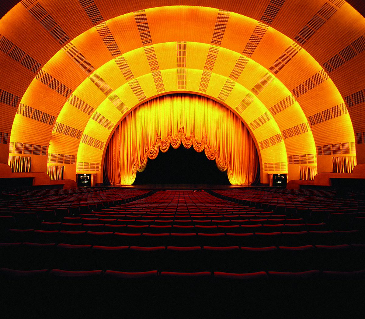 RadioCity's tweet photo. Radio City's sunset-inspired stage has kept theatergoers spellbound for nearly a century. Get exclusive access to take it all in: https://t.co/Gsgx7z3J24 https://t.co/koTKovsGxG