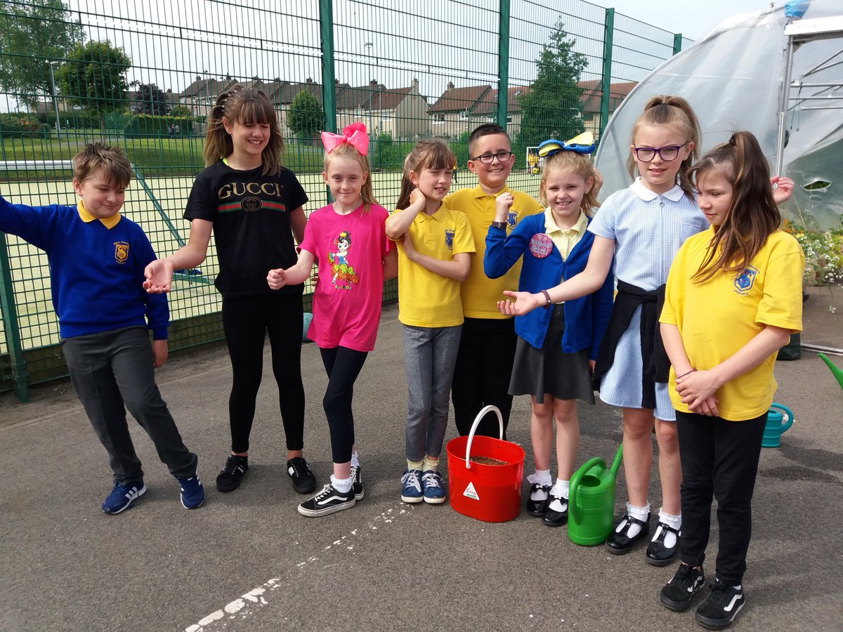 ToniGPASP's tweet photo. St Timothys p5 and p6 today helping to water the pollytunnel and all their plants , they also harvested some onions , and they were not too keen on the Comfrey feed they had made as it was a bit stinky , but they do have their own feed for their tomatoes so well done . https://t.co/EFcMK9m43f