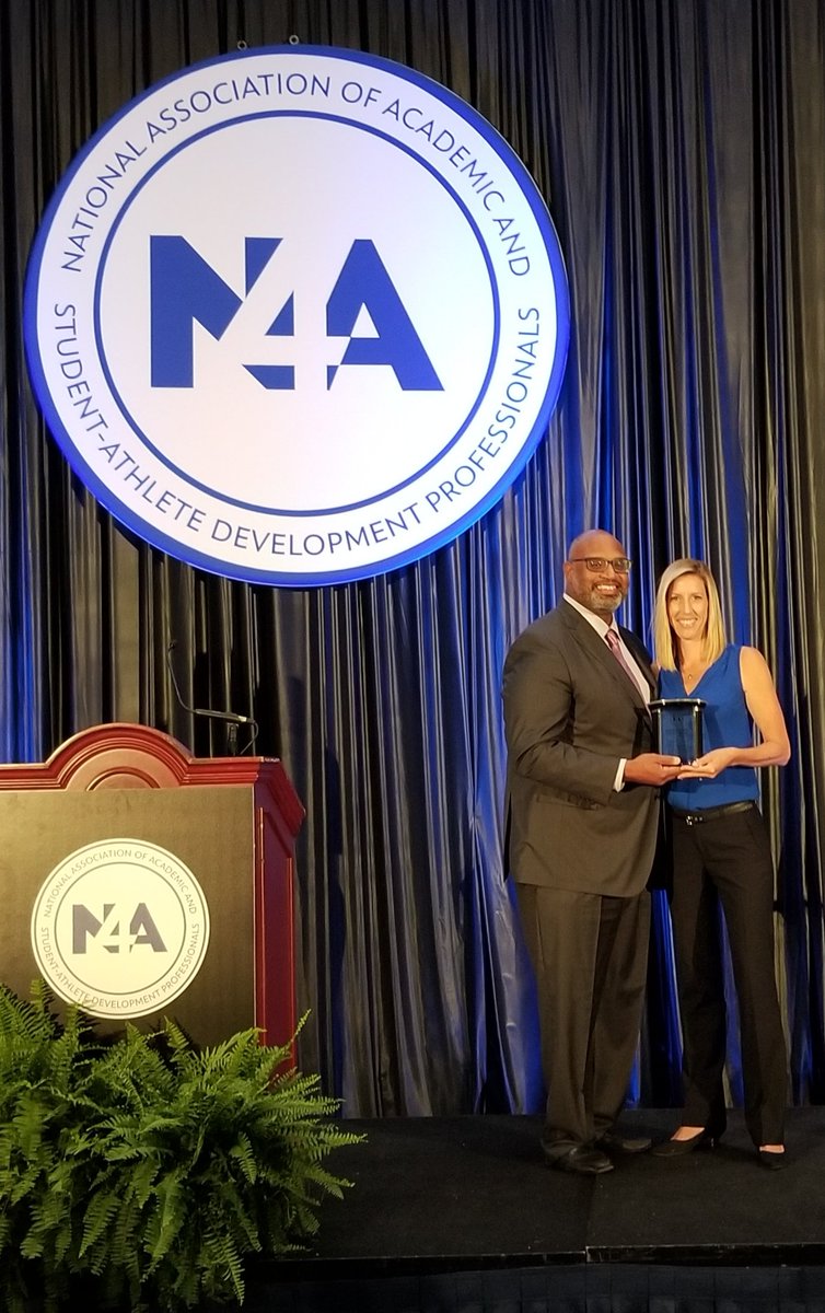 Congratulations to @UMKCathletics @UrsulaGurney 2018 @nfoura Distinguished Service Award recipient! Thank you for your #AboveAndBeyond service to the profession, administrators, coaches and @UMKansasCity student-athletes! #servantleader #UMKCProud #TeamKC #N4A18