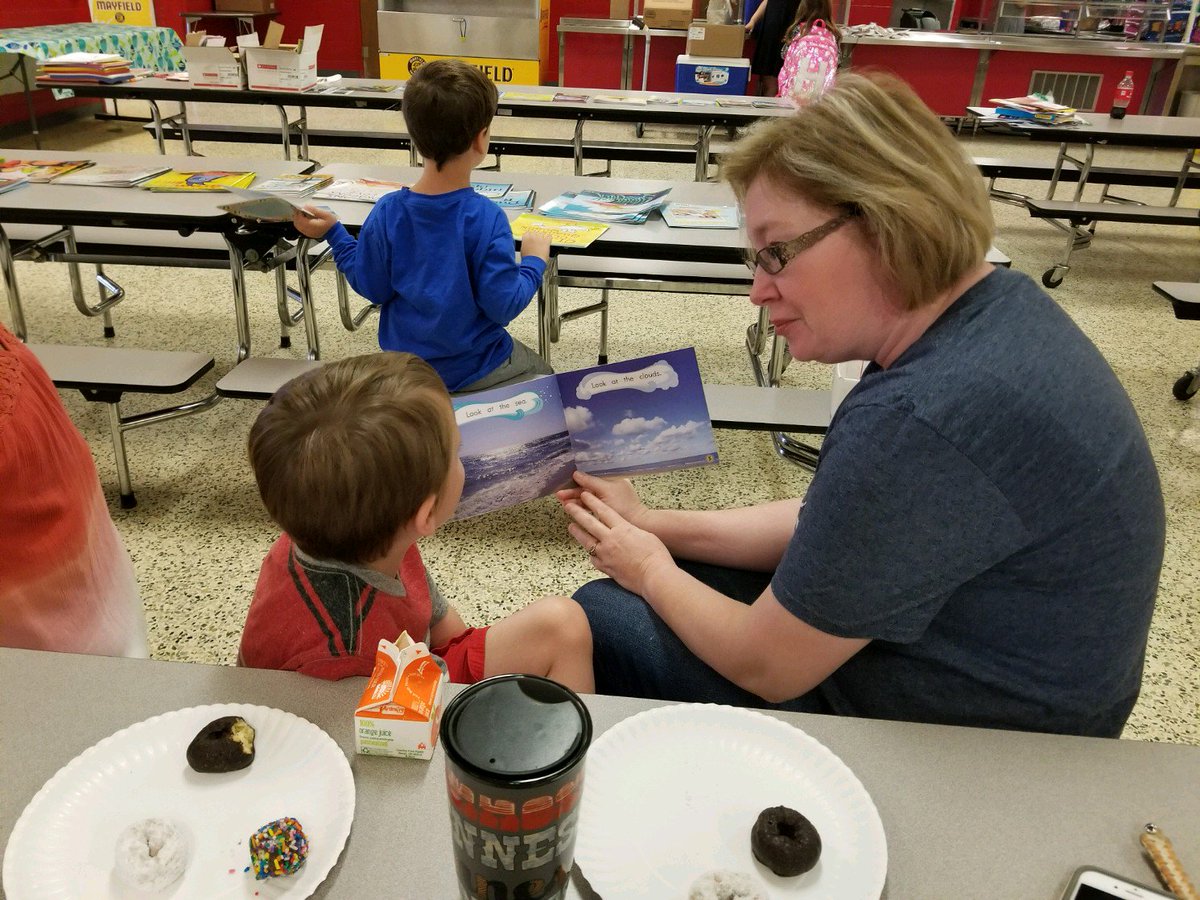BentonElem's tweet photo. You DOUGHNUT know how successful our #R2BR breakfast and books were this morning! Families enjoyed reading together and eating tasty donuts! #summercamp #familyengagement #readingislit @PCNTN @PolkTNSchools @ReadtobeReadyTN https://t.co/Q9KJCvWcaV