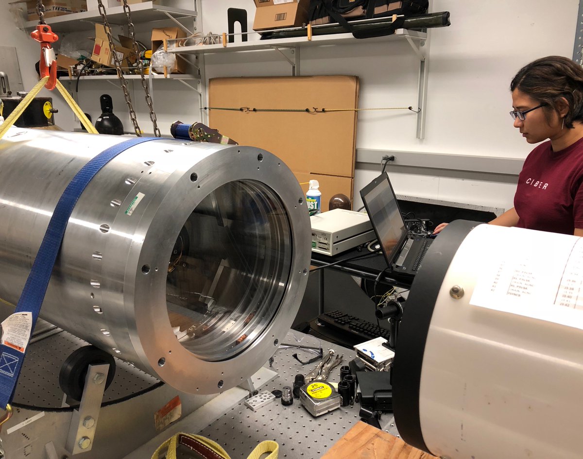 RITphotonics's tweet photo. #RITPhotonics students are working hard this summer. Chi Nguyen, @cosmo_chn, takes test images this week at @Caltech to characterize the CIBER-2 telescope as the payload (left) is being cooled down to 77K. #RITstudents #RITastro https://t.co/Egy0xBsum3