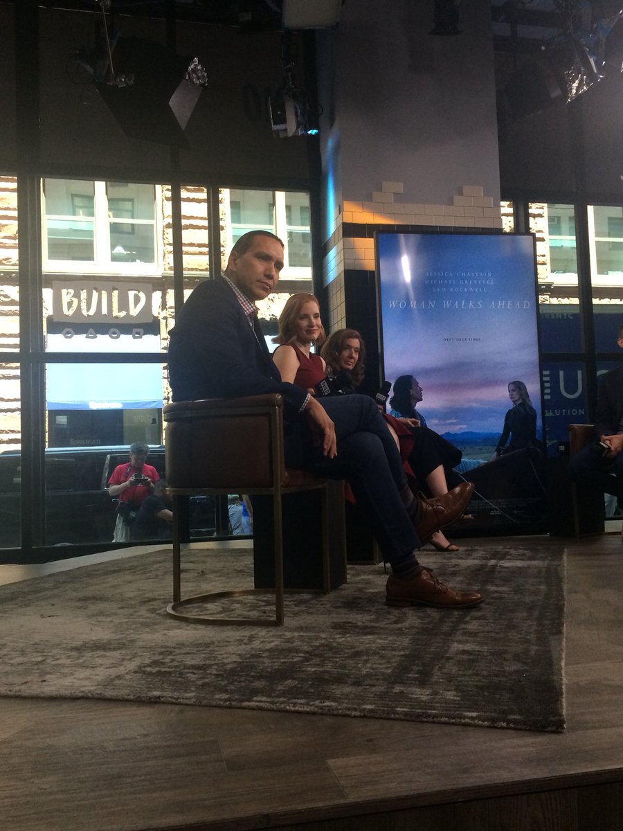 Woman walks ahead build interview