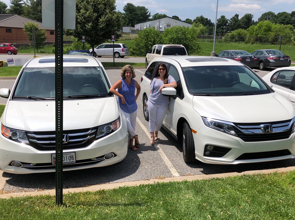 Matching parking spots = matching vans.  #twins #minivanmoms