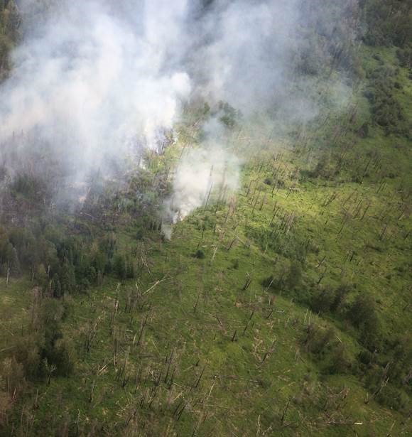 Update 2:14 pm June 26th: Wildland firefighters with helicopters and airtankers are fighting a holdover lightning wildfire located approximately 4 kilometres south of Bayer Road. If you have questions please call Wildfire Information Officer Leah Lovequist 780-849-0945.