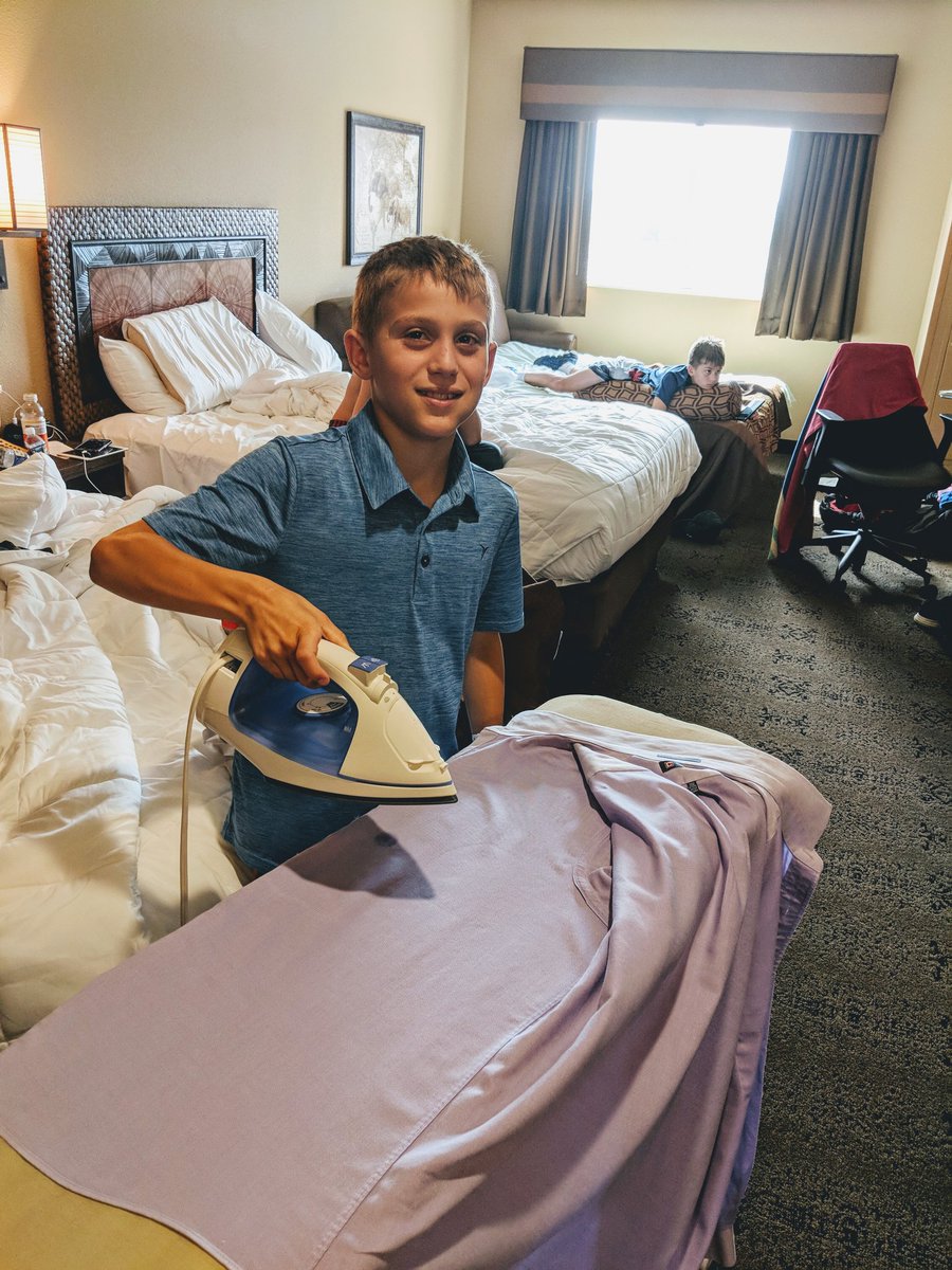 terpowl's tweet image. One advantage of having the family at this years conference ...  Having my son iron my purple shirt before the Gustafson Gala... @PACAC1954 #pacac #purpleandgold