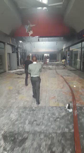 MuhammadRazaCo2's tweet photo. Secunda is on fire but no news abut this @ your station This is what is left of the mall Embalenhle @iamthabomdluli https://t.co/hi6TuF4XC6