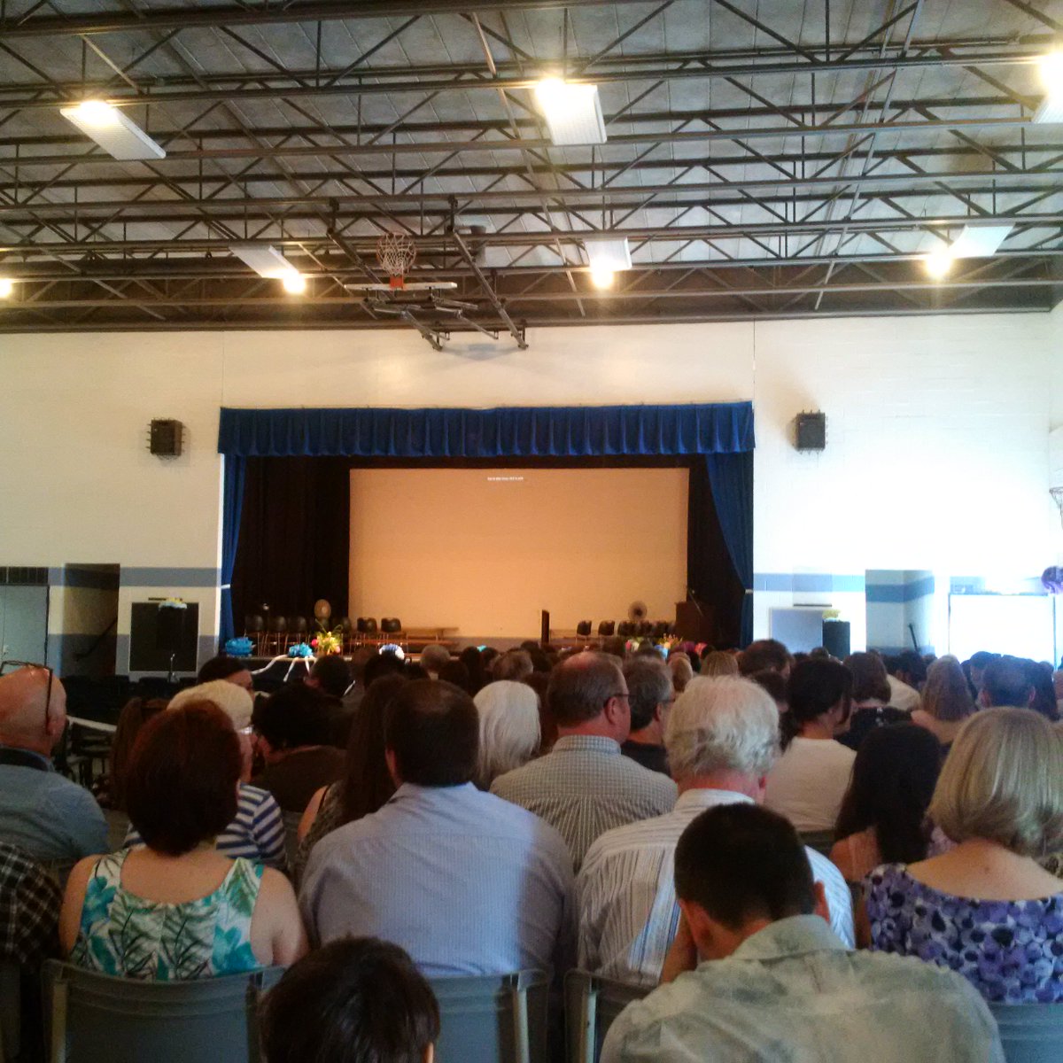 Inspired_BTM's tweet photo. Sitting &amp; waiting for my youngest to walk across the stage for his Gr 8 grad. How did my baby get so old, so fast? https://t.co/VfRHRRFTwc