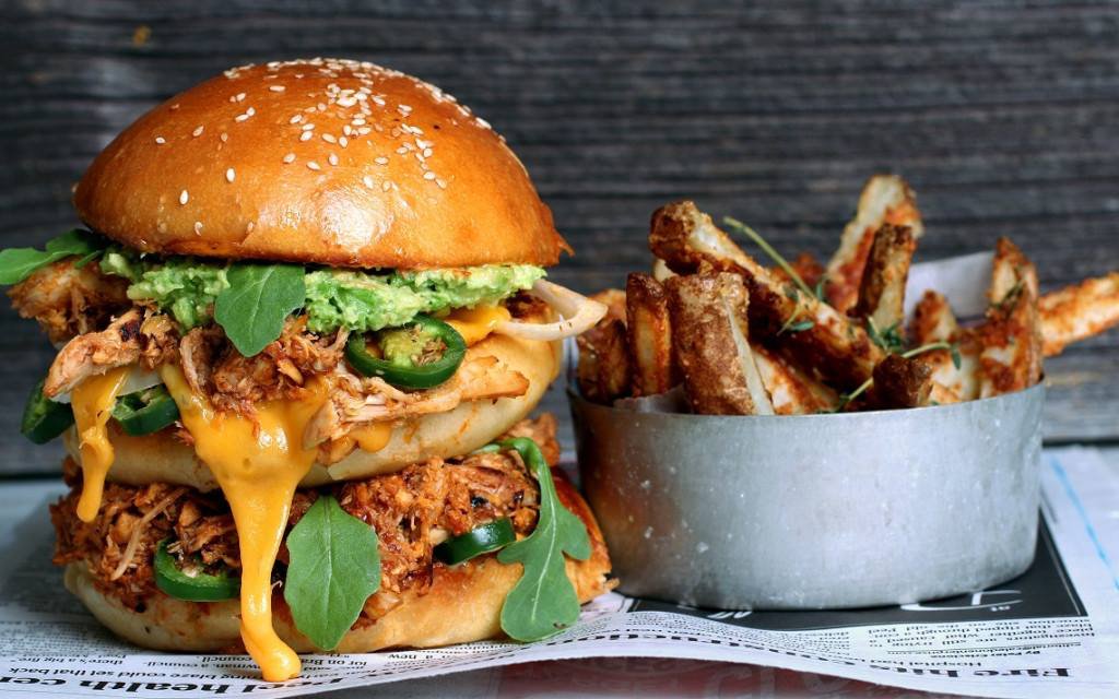 Summer just got a bit hotter thanks to this <a href="/nancyscravings/">Nancy Crocker</a> Pulled Organic Chicken Burger with Smashed Avocado, Jalapenos and Cheese Sauce!