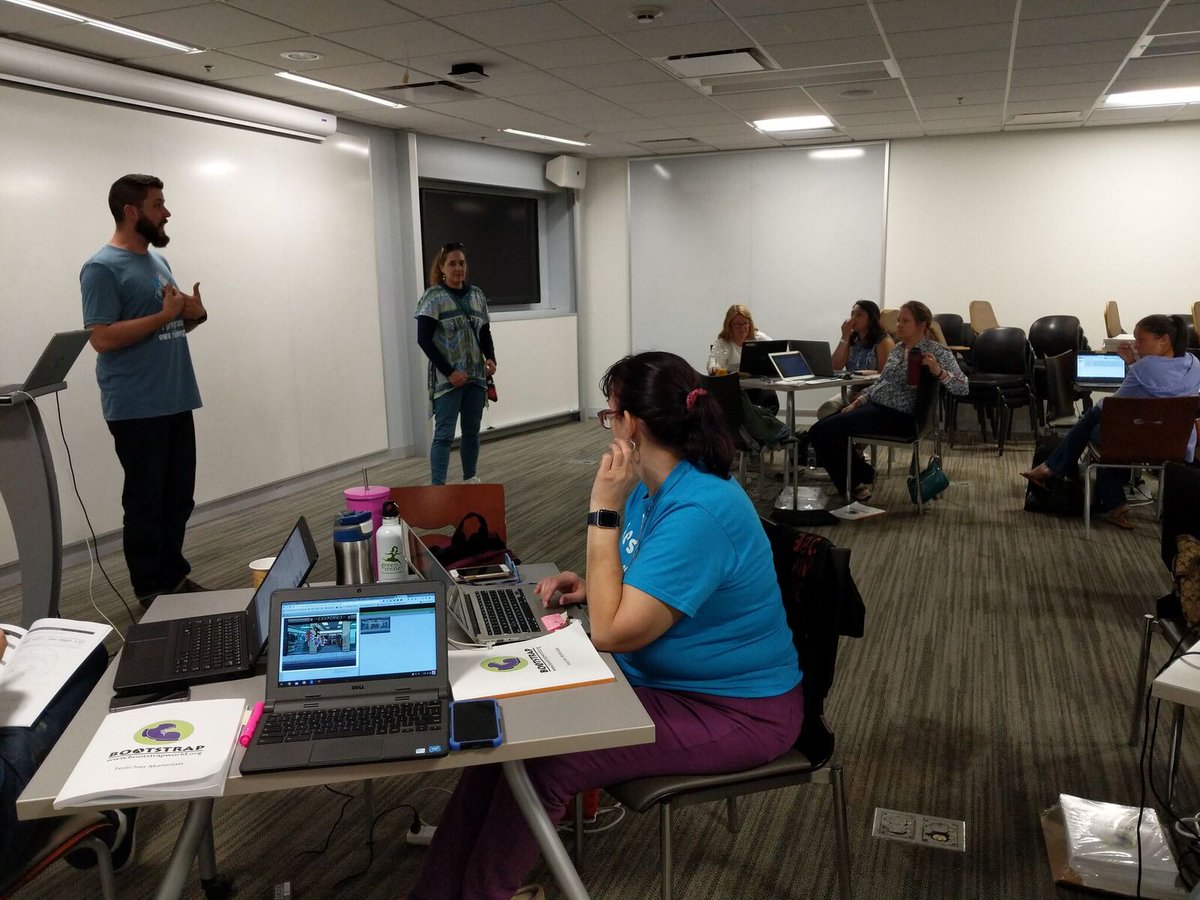 Bootstrapworld's tweet photo. Rhode Island math teachers are wrapping up their video games today and Bootstrap Ambassador @Mr_Newall and an awesome volunteer are modeling the distance between images so teachers can get the collision to work in their videogames! They are so close! #csk8 #MTBoS #DistanceFormula https://t.co/kDTkaGjFpJ