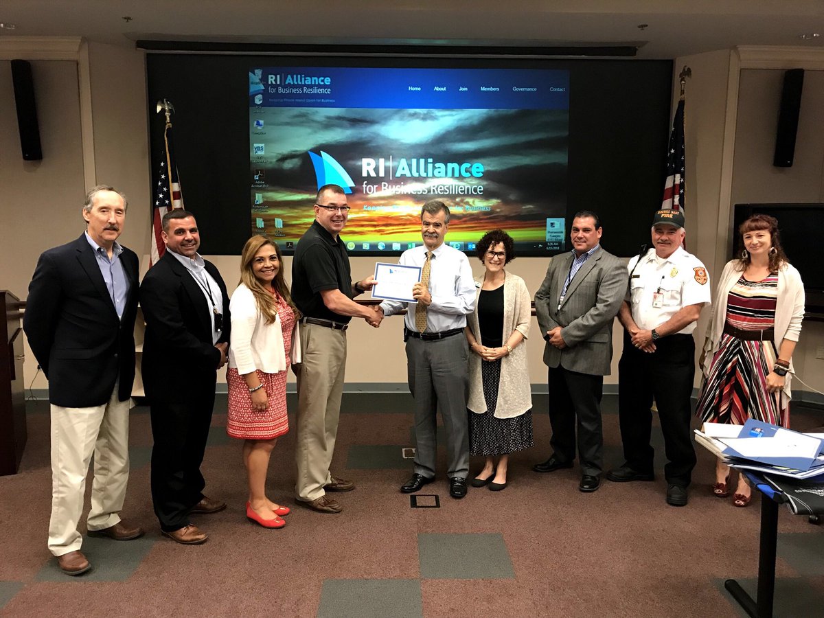 ⁦<a href="/RhodeIslandEMA/">RI Emergency Management Agency</a>⁩ Director Peter Gaynor gives a membership certificate to Steve Arthurs of the Rhode Island Food Dealers Assoc.  The RIFDA is one of five businesses to join The Alliance at the meeting earlier this month. Congratulations!