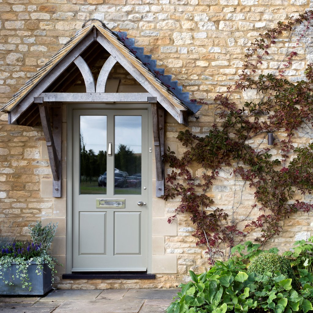 There is something so perfect in the way #Cotswoldstone and this oak porch sit with each other - so inviting.

Spatial &amp; #InteriorDesign and Project Management by Pippa Paton Design