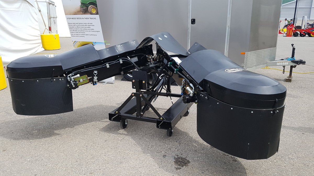 realagriculture's tweet photo. Instead of spreading weed seeds at harvest, this Australian-made device is designed to confine weed seeds to a combine's wheel tracks (where they can rot or be sprayed.) https://t.co/sLvq3NcVrn #CFPS18 https://t.co/44EYZwNa46