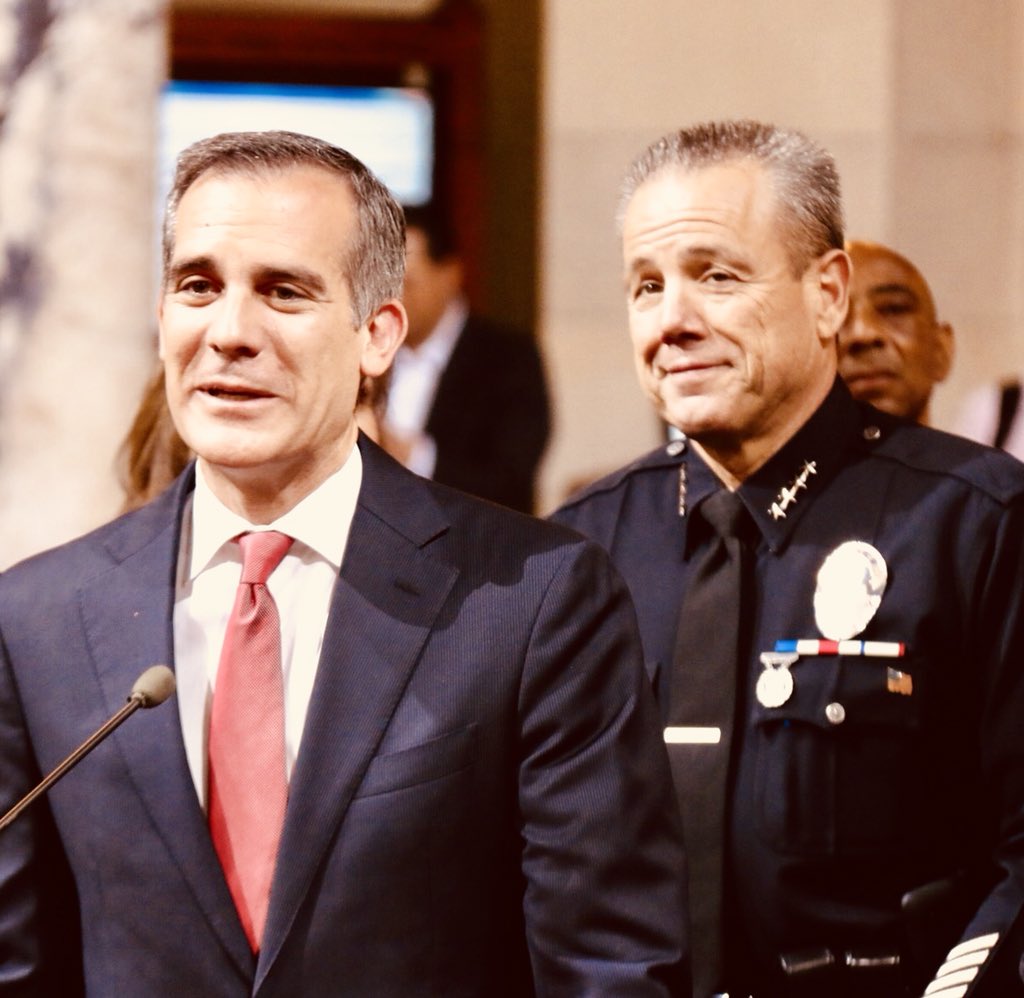 knxpete's tweet photo. #LAPD #ChiefMoore #ChiefBeck. Charlie Beck watches as Micheal Moore is sworn in as 57th LAPD Chief. Beck then leaves Police Administration Building for last time...in style...behind wheel of 1964 Pontiac GTO. Have a nice drive into the sunset Chief..@KNX1070 https://t.co/QOi0FrI7Pu