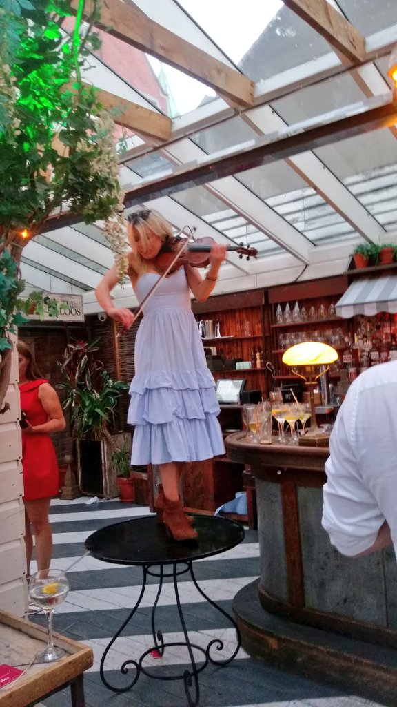 AineMulloy's tweet photo. It's not a party until the musicians are on the table @Herdotie #HerSummer18 https://t.co/IYErGWvnK7