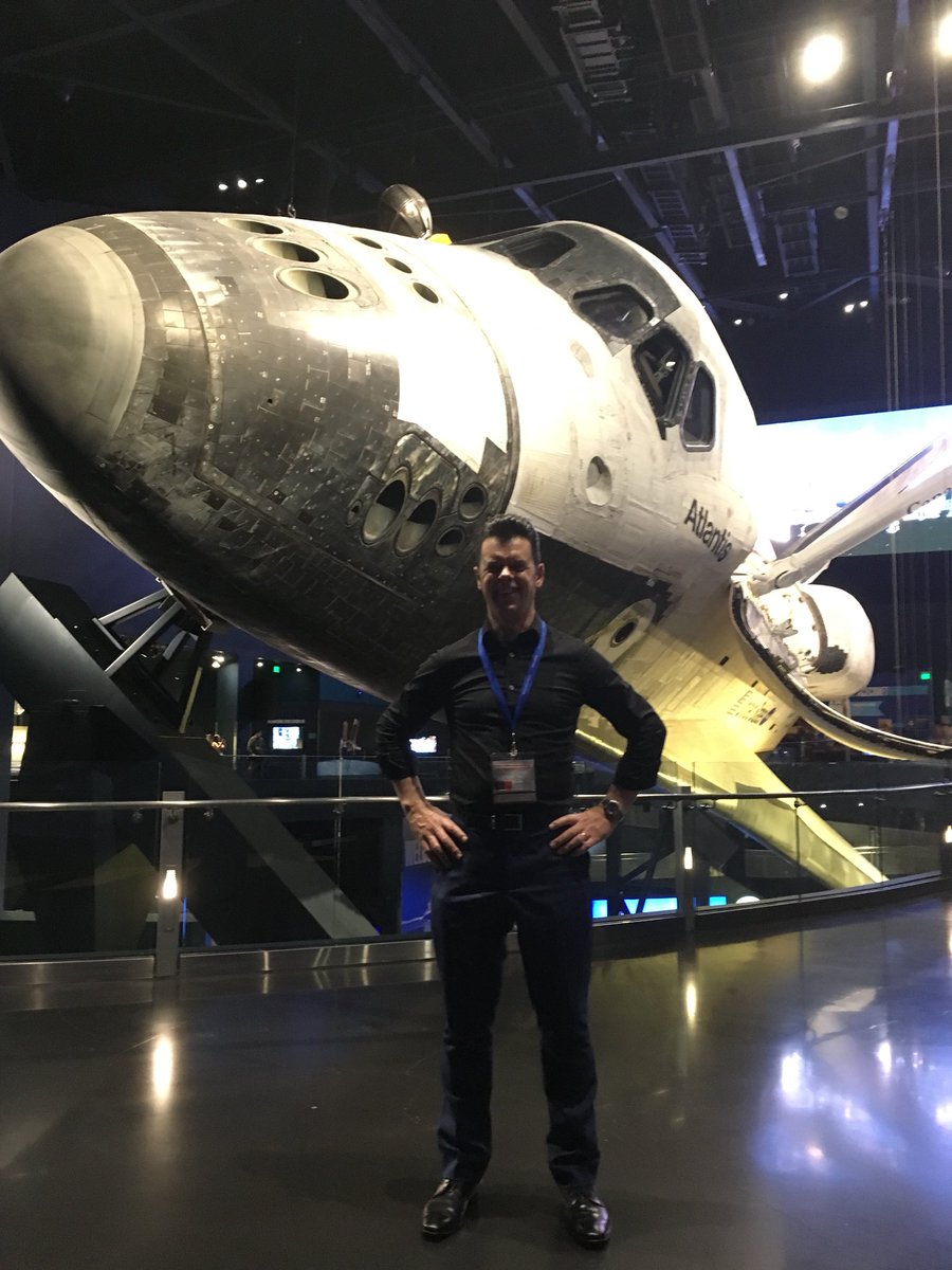 SwadeWade's tweet photo. Wow, what a place for a conference dinner for #icmcf, under the space shuttle Atlantis at the Kennedy Space Centre. Plus there’s going to be a launch on Fri which I’ll get to see. #biofouling #corrosion https://t.co/Rtx40lXnzd